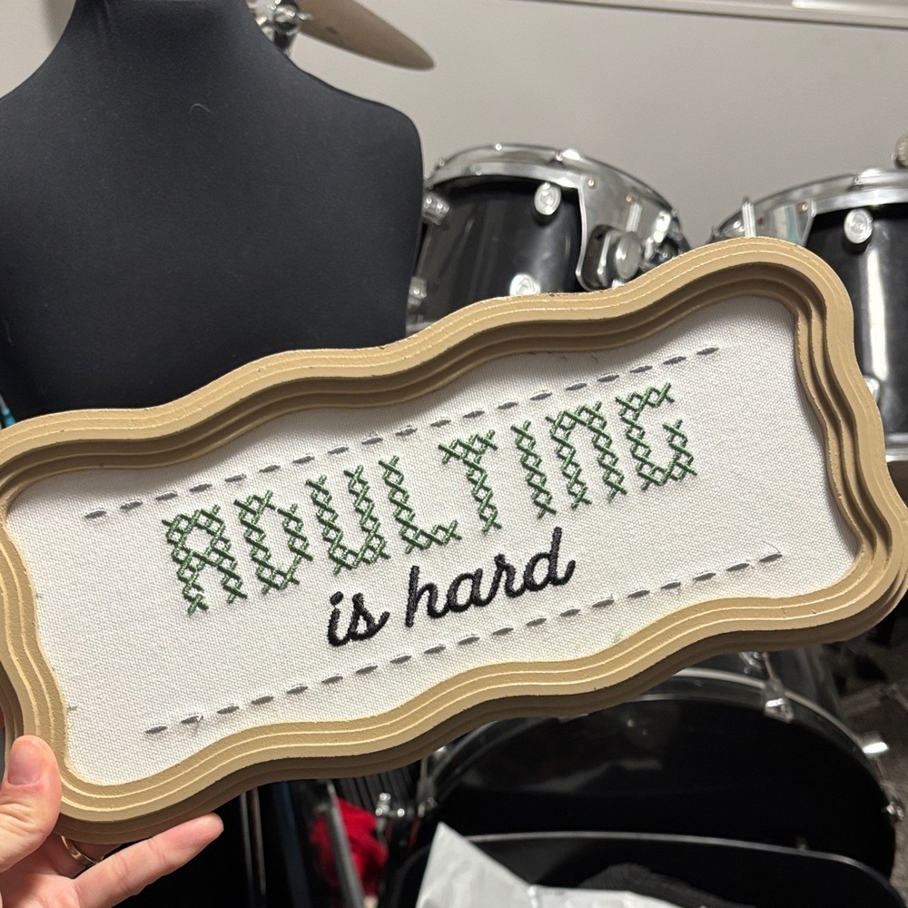 Embroidered Wall Art with Green and Black Text